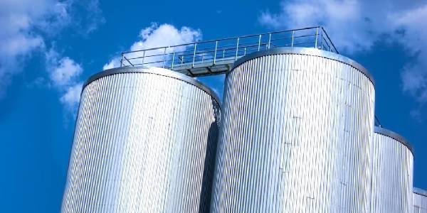 Image That Represent The Industrial Storage Tank In Sky Background.
